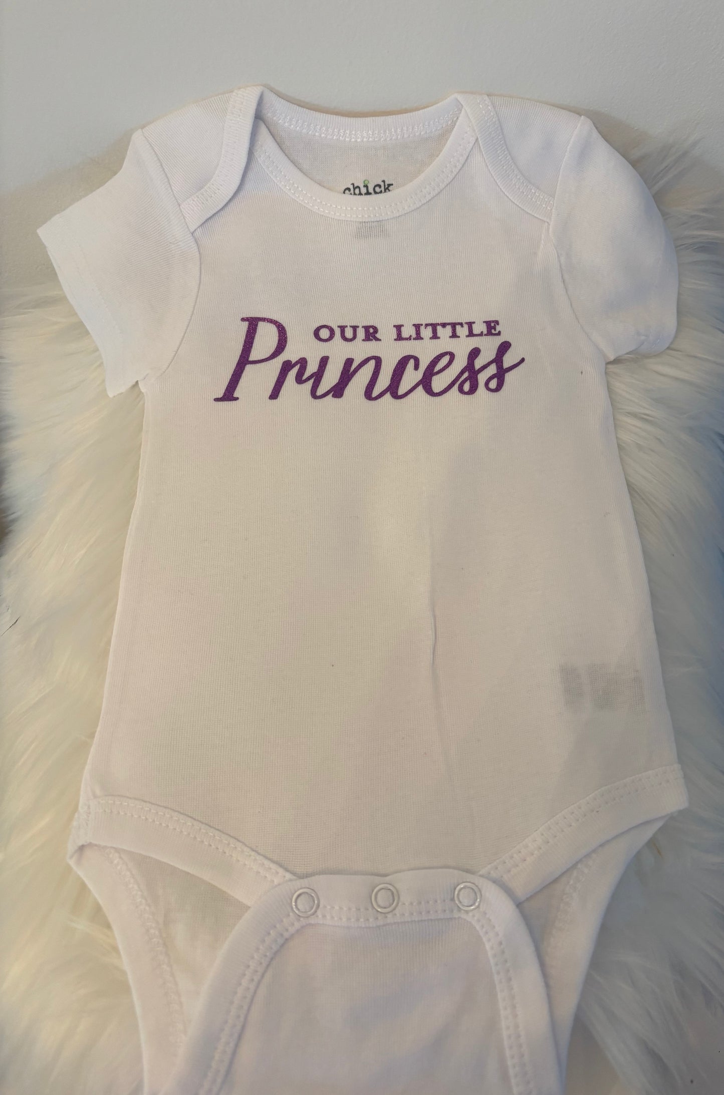 THE PRINCESS HAS ARRIVED ONESIE